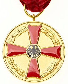 Gold medal on white background